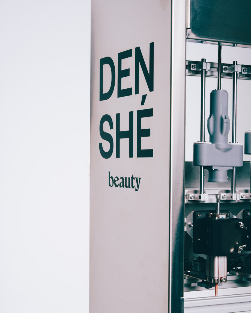 The Denshé Beauty Signature Skin Foundation in a frosted glass bottle with an aluminium coated pump